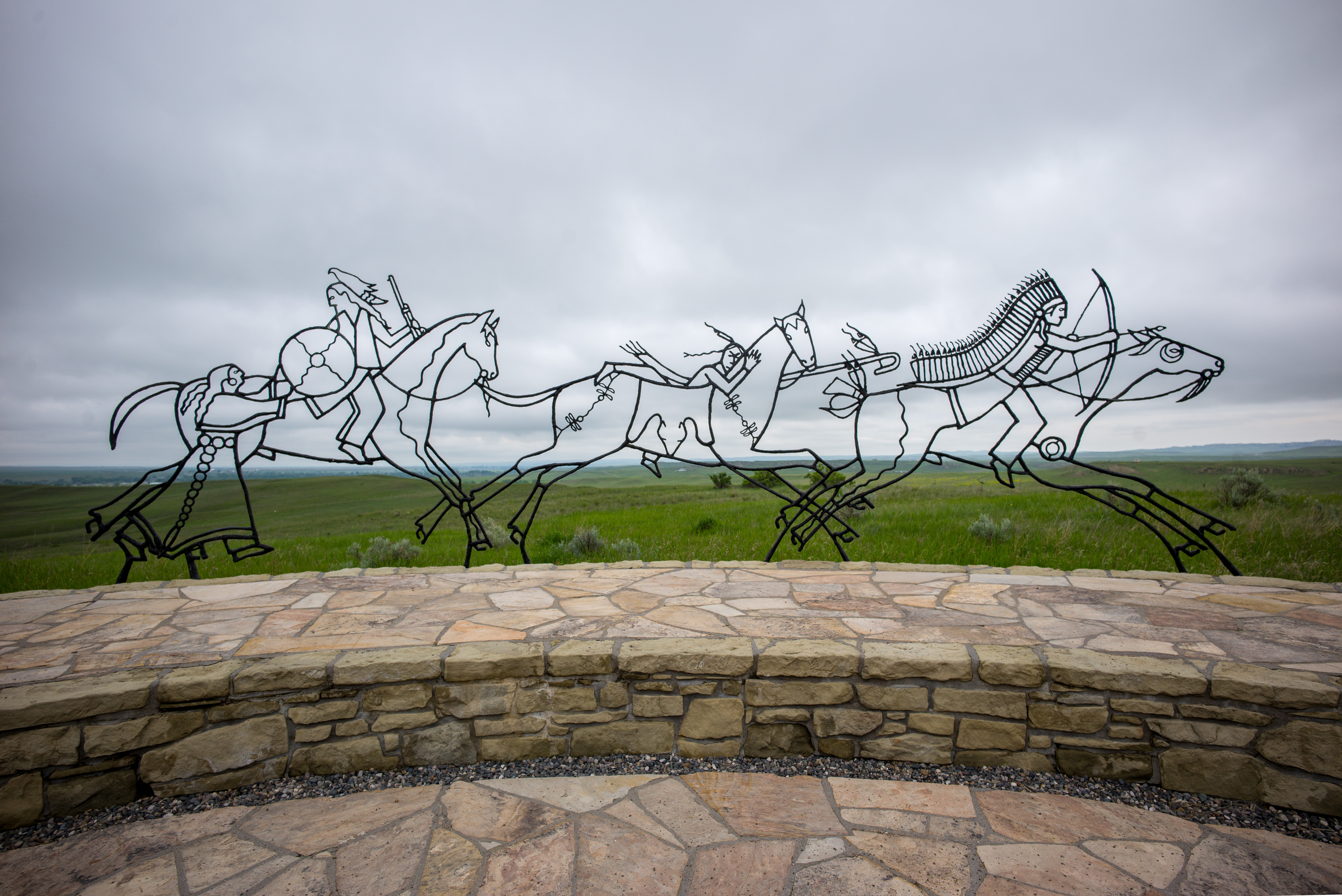 Iron sculpture by Native artist Colleen Cutschall honoring the Native Americans. Placed next to the old memorial for Custer. Commemorates the Native Americans (Crow tribe) who died fighting for their homelands in the 1876 Battle of Little Bighorn” [Wikipedia]. Note: the Crow and Arikara were allied with the US Government